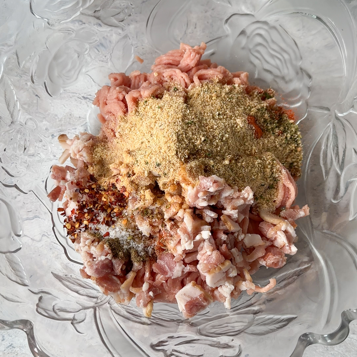 Add all ingredients to a big bowl & mix.