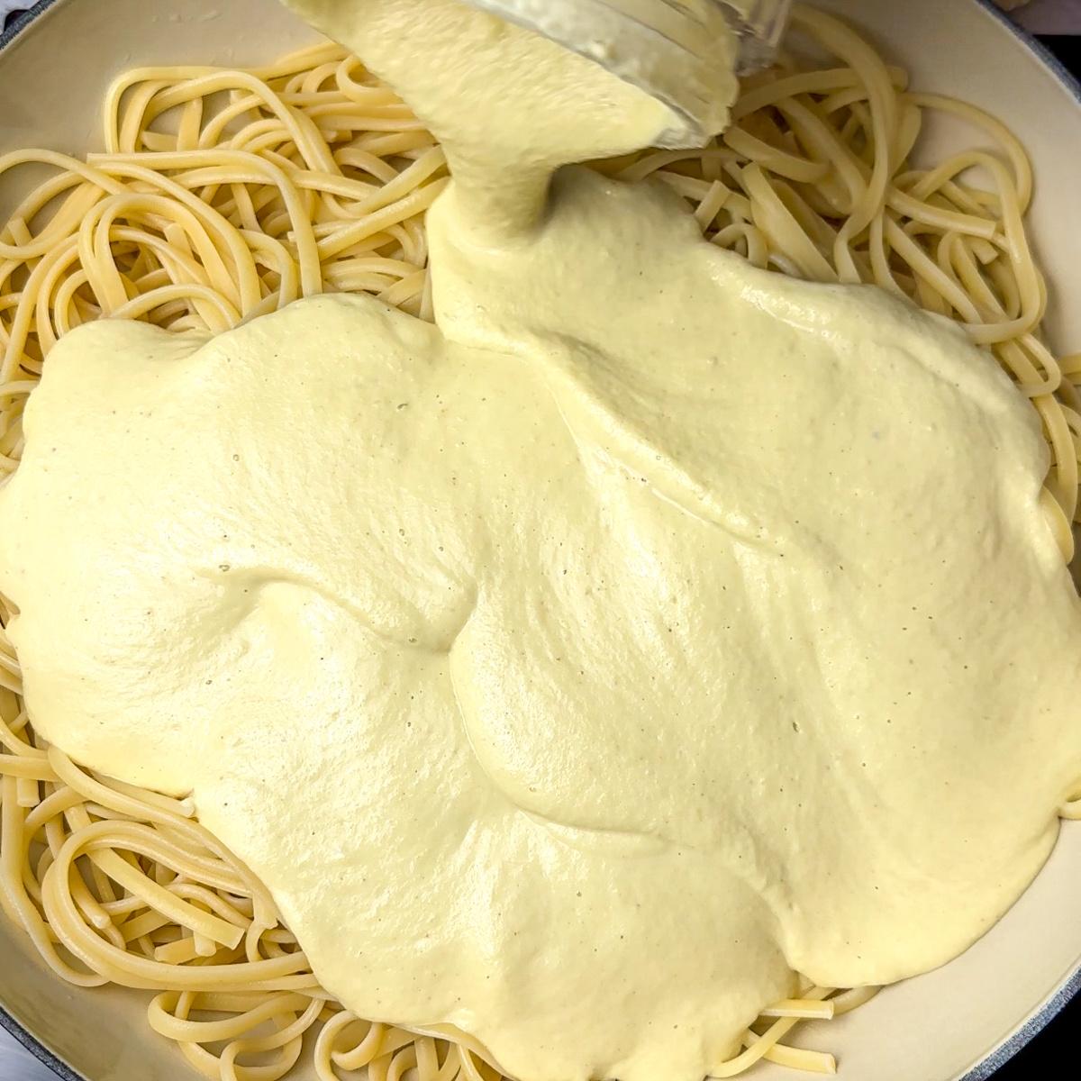 Blend everything together & pour the sauce over the fettuccine!