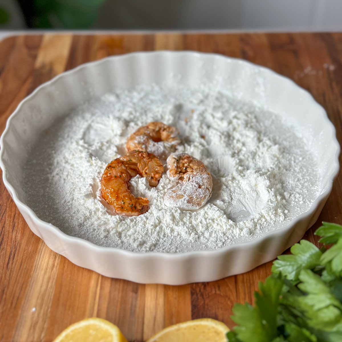 Marinate the shrimp & coat in corn starch.
