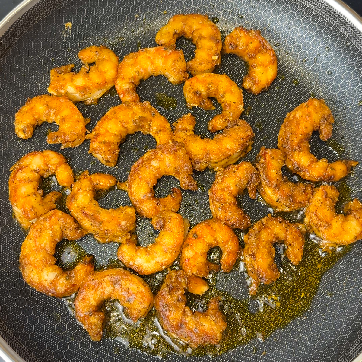 Pan fry shrimp for 1-2 minutes on each side.