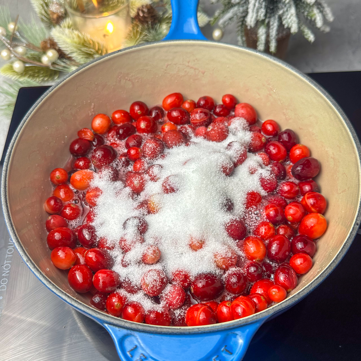 Add cranberries, sugar & lemon juice to a saucier