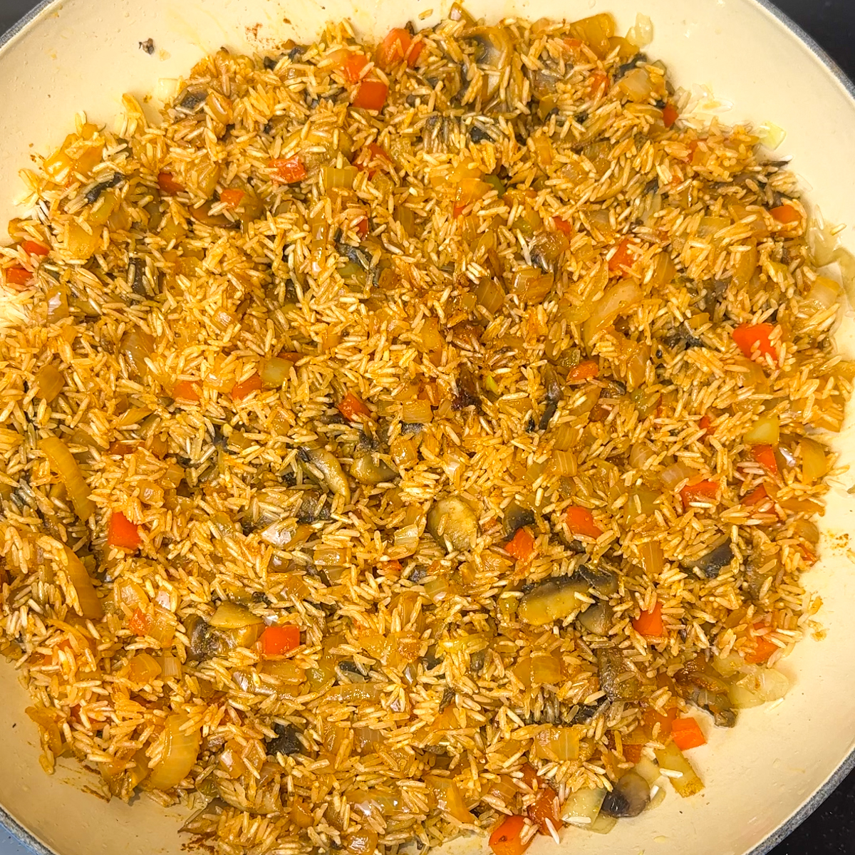 Sauté the diced veggies & rice!