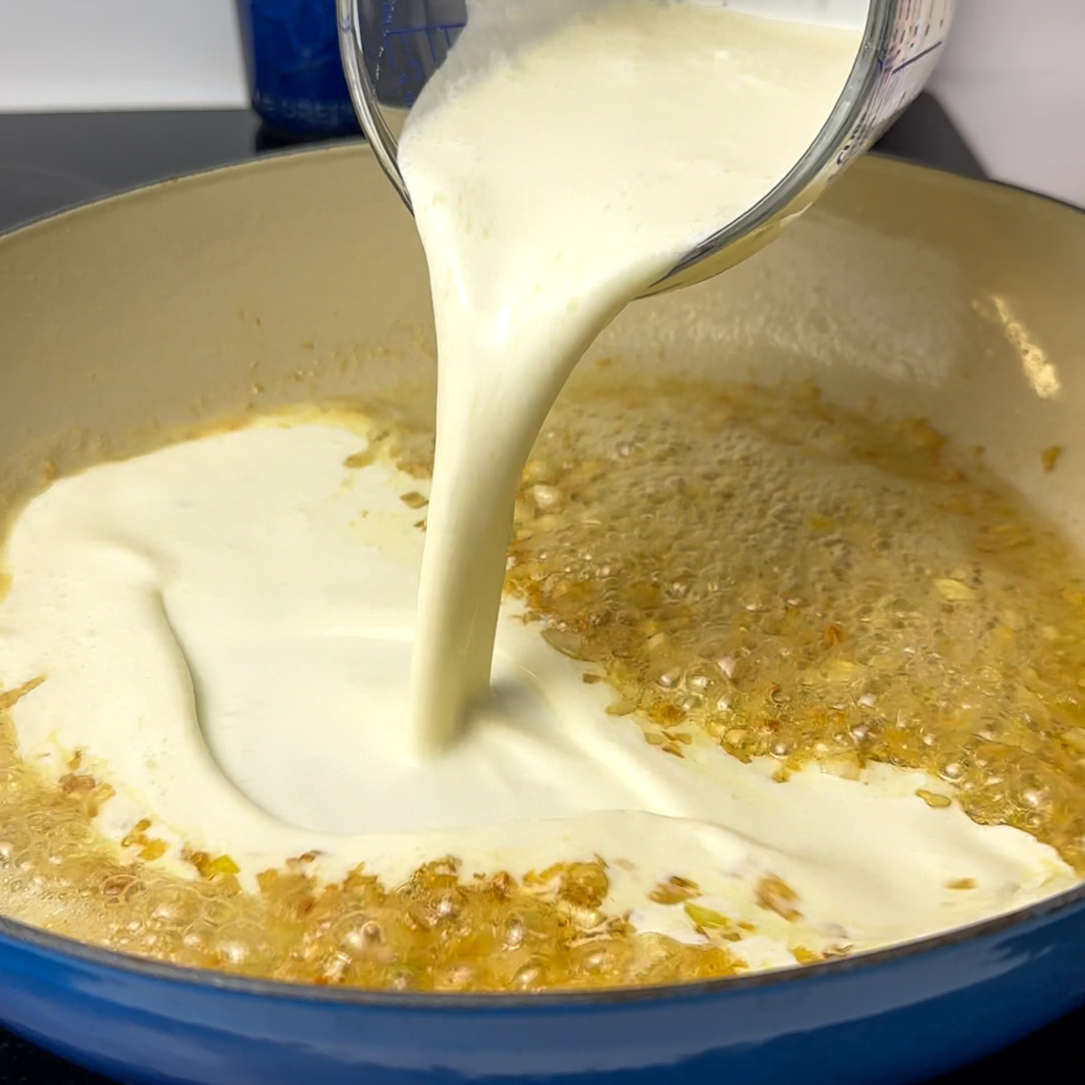 Add in heavy cream , flour slurry & asiago cheese!