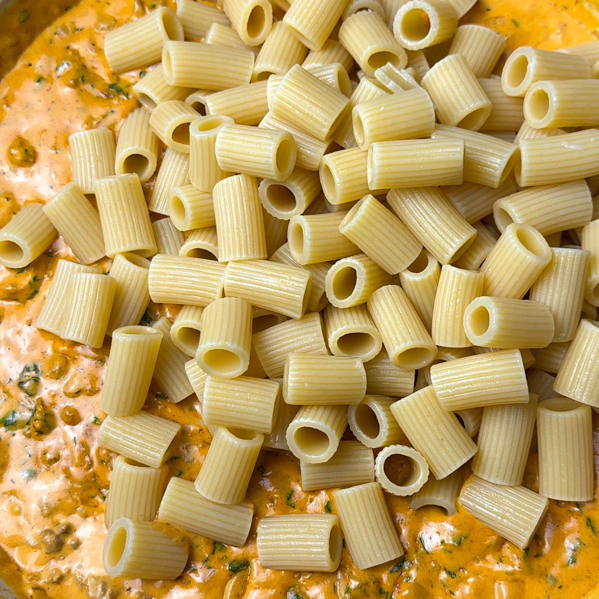 Add in the aldente pasta.