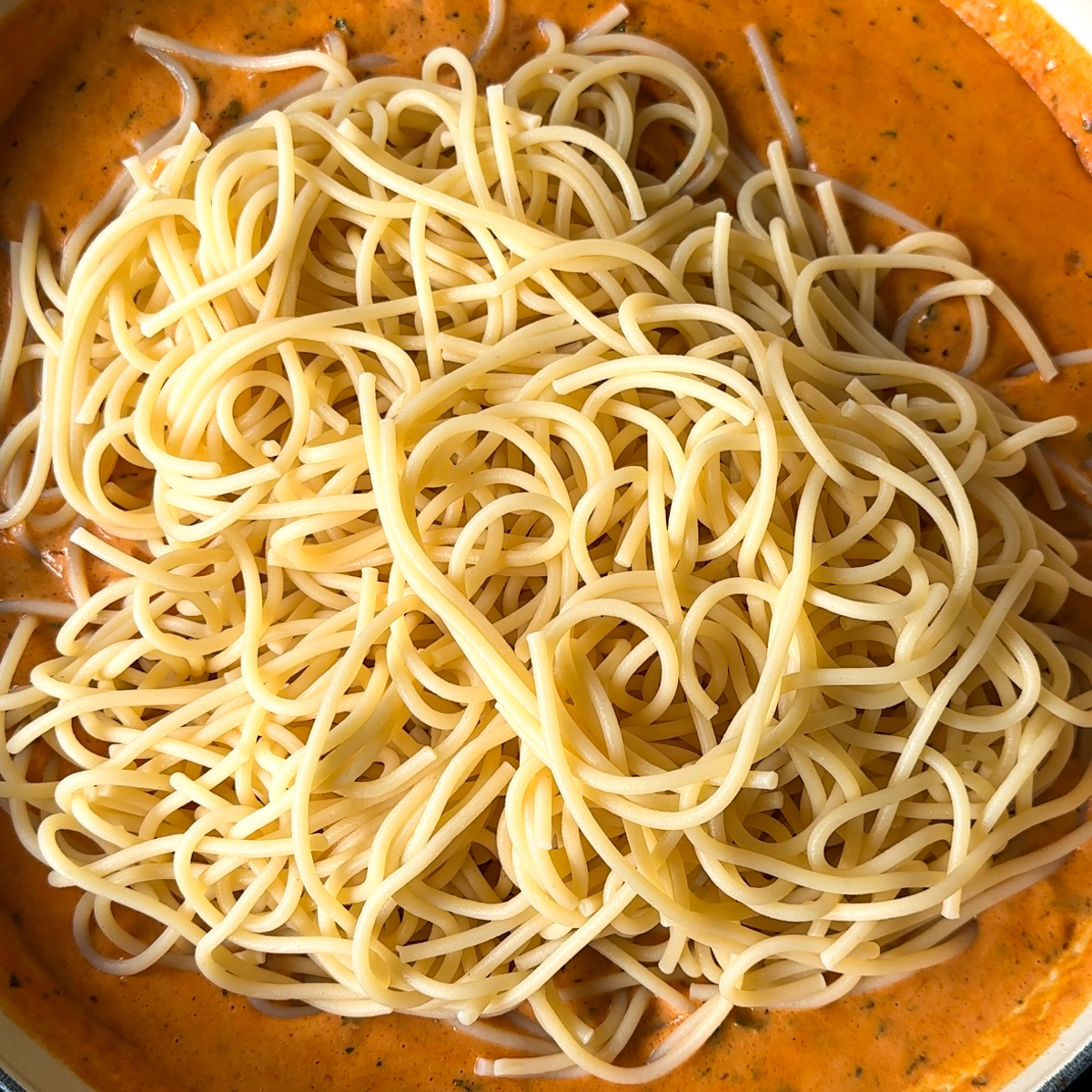 Finish up the pasta sauce & add in the aldente spaghetti!