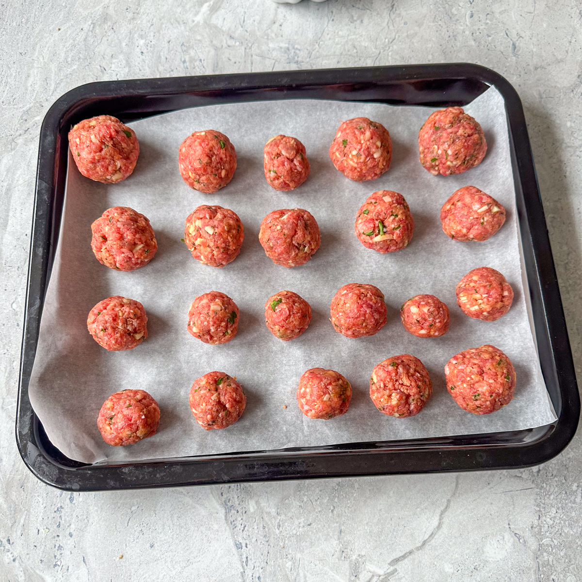 Prepare the meatball mixture, roll into little balls & bake!