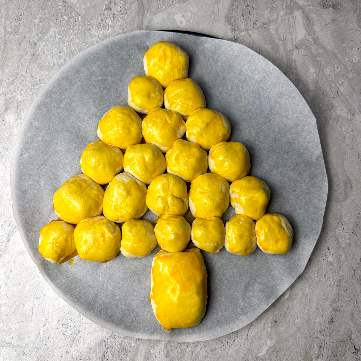 Roll into balls, shape into trees & brush with egg yolks!