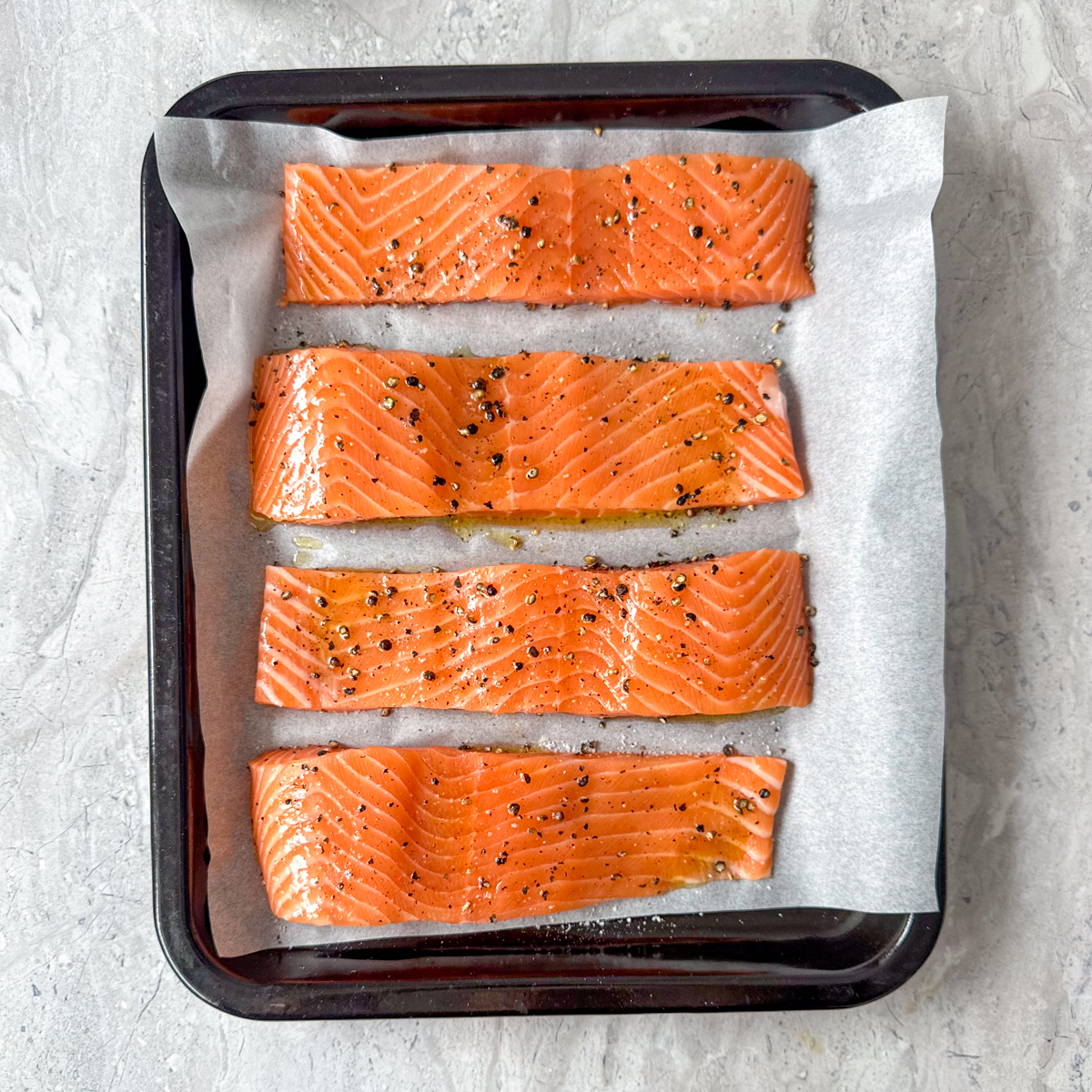Salt & pepper the salmon filets & bake for 15 min!