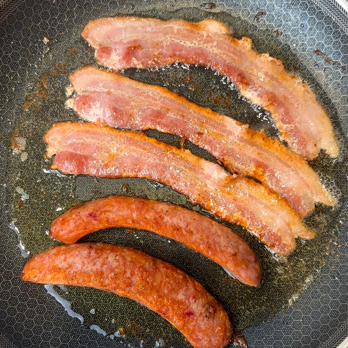 Fry the Canadian bacon & sausage! Set aside...