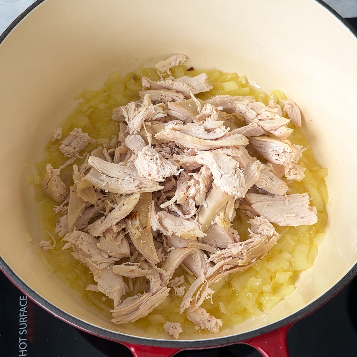 Sauté the diced onion & add in the shredded rotisserie chicken!