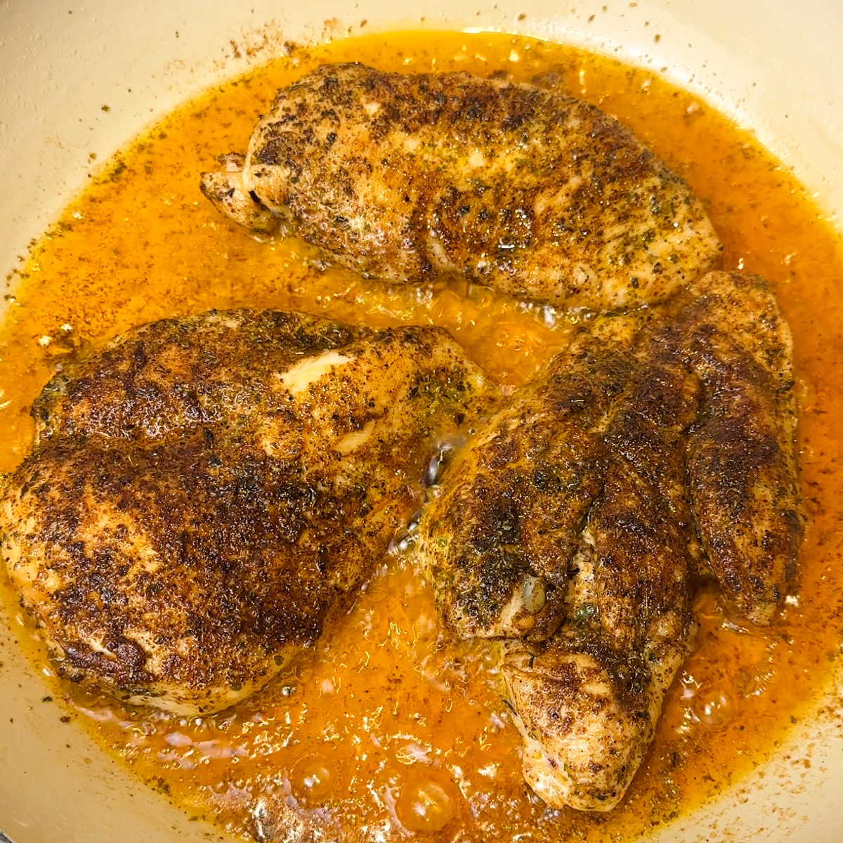 Fry the chicken cutlets on each side until fully cooked through!