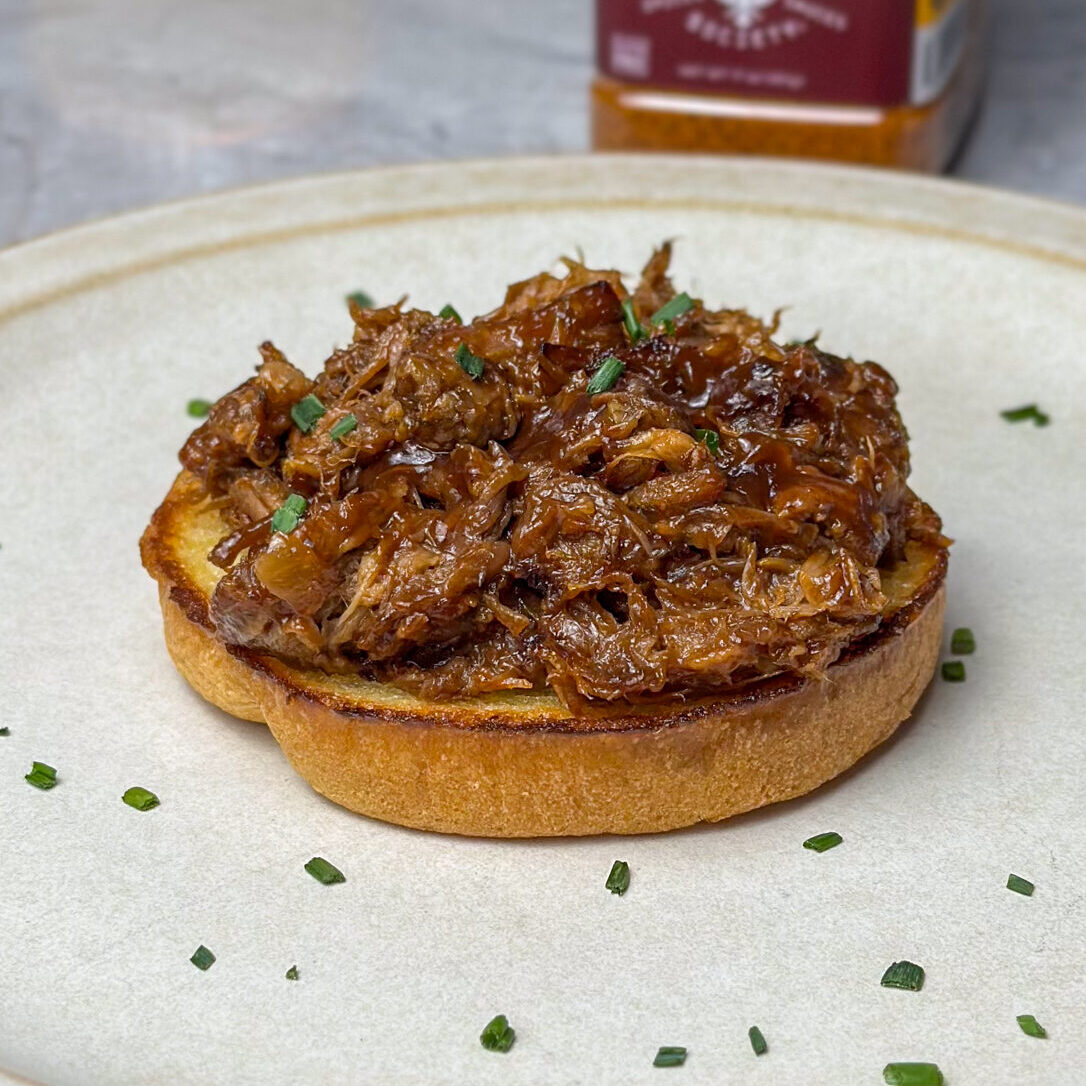 Once, it's slow cooked, shred & serve on toasted buns!