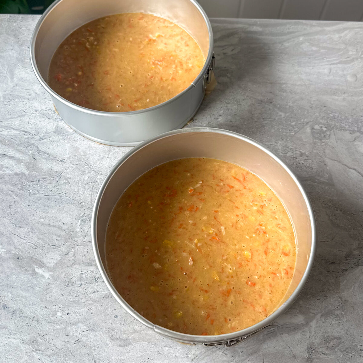 Transfer to cake pans & bake for 25 min!