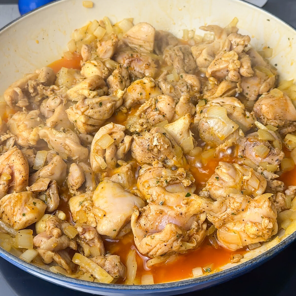 Sauté the onion & cook the cubed chicken thighs!