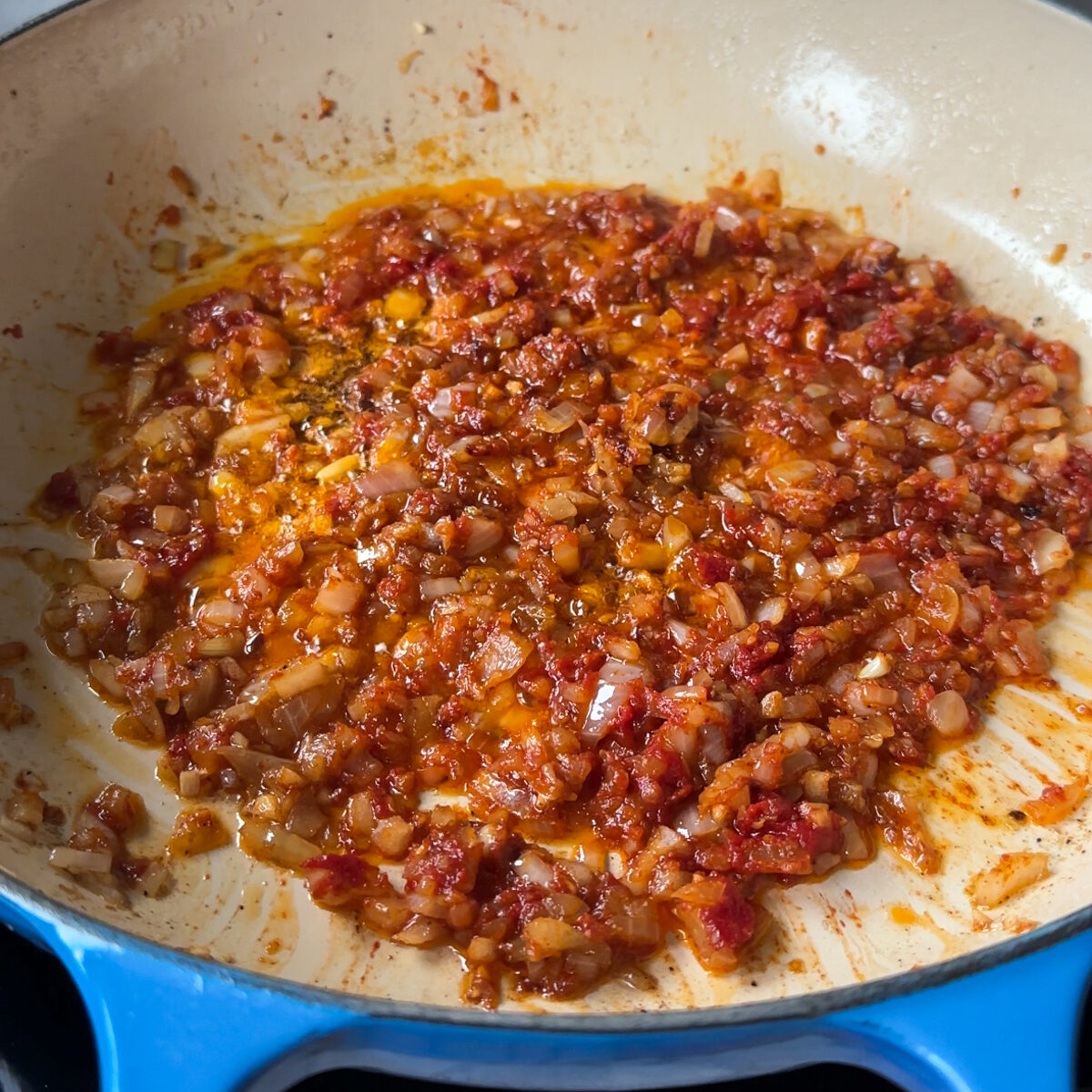 Sear steak & set aside. Sauté veggies with the tomato paste.
