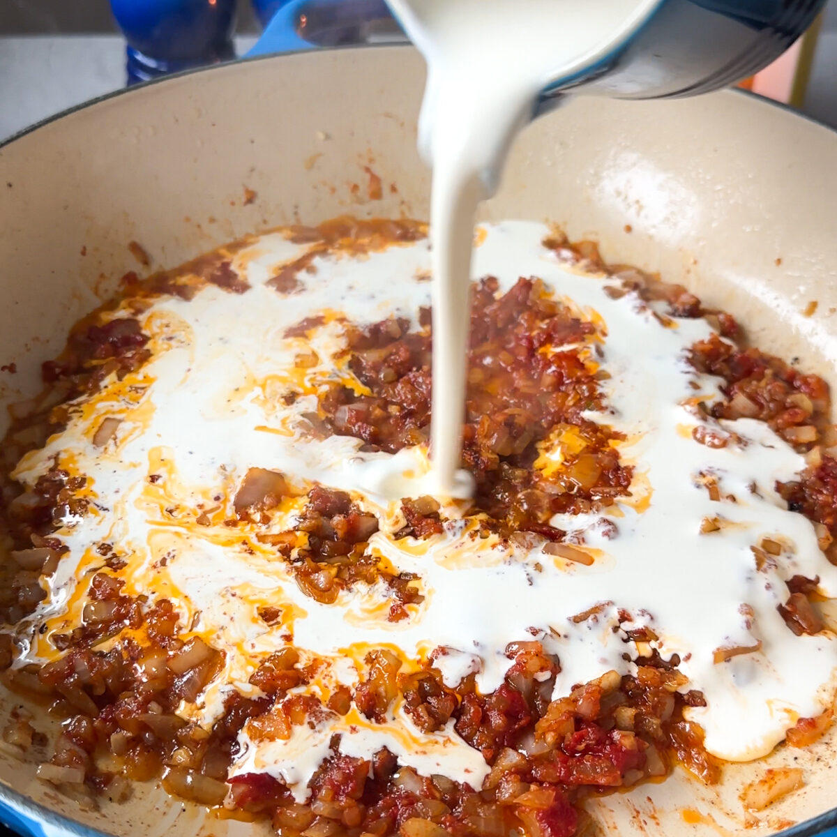 Add in the heavy cream & let the sauce thicken!