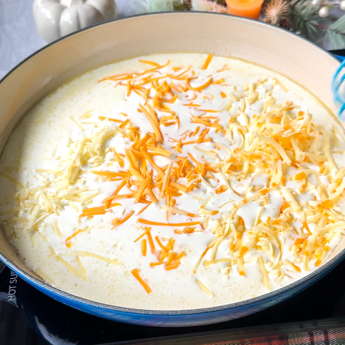 Add all the cheeses & our spices!