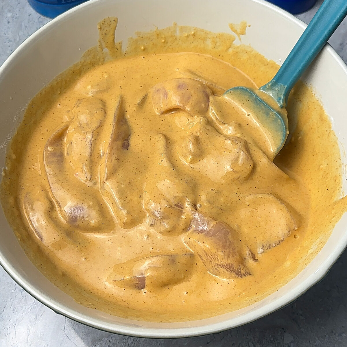 Add in the chicken strips & mix until fully coated!