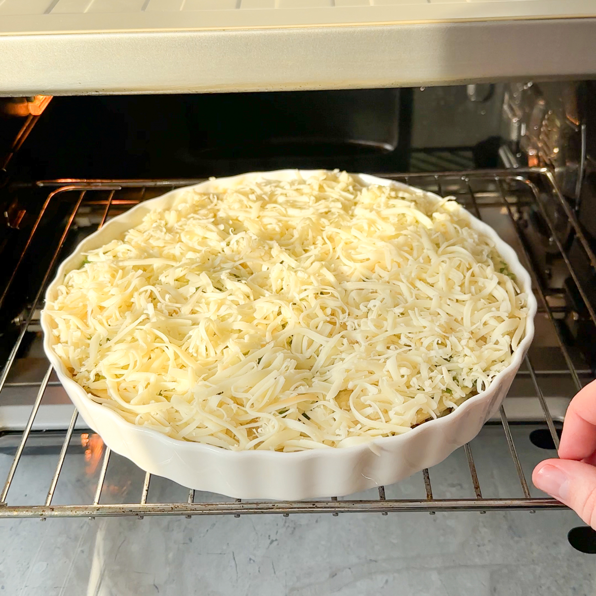 Cover with butter garlic & the freshly shredded cheese & bake!