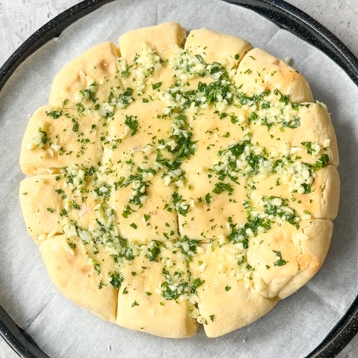 Preheat the oven & add garlic butter!