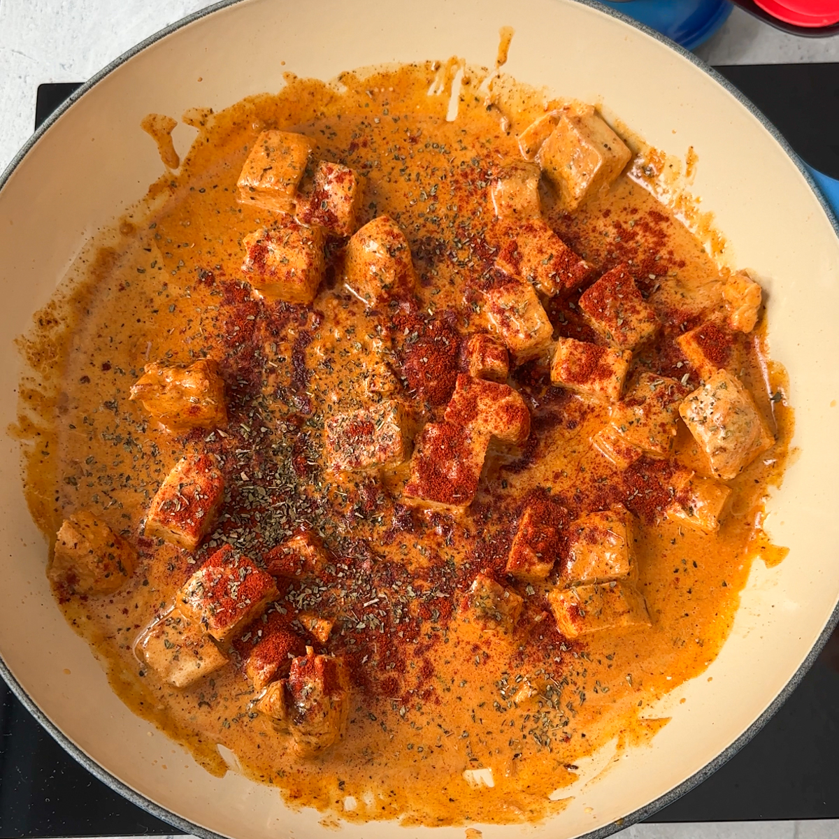 Add the veggies & heavy cream along with our spices!