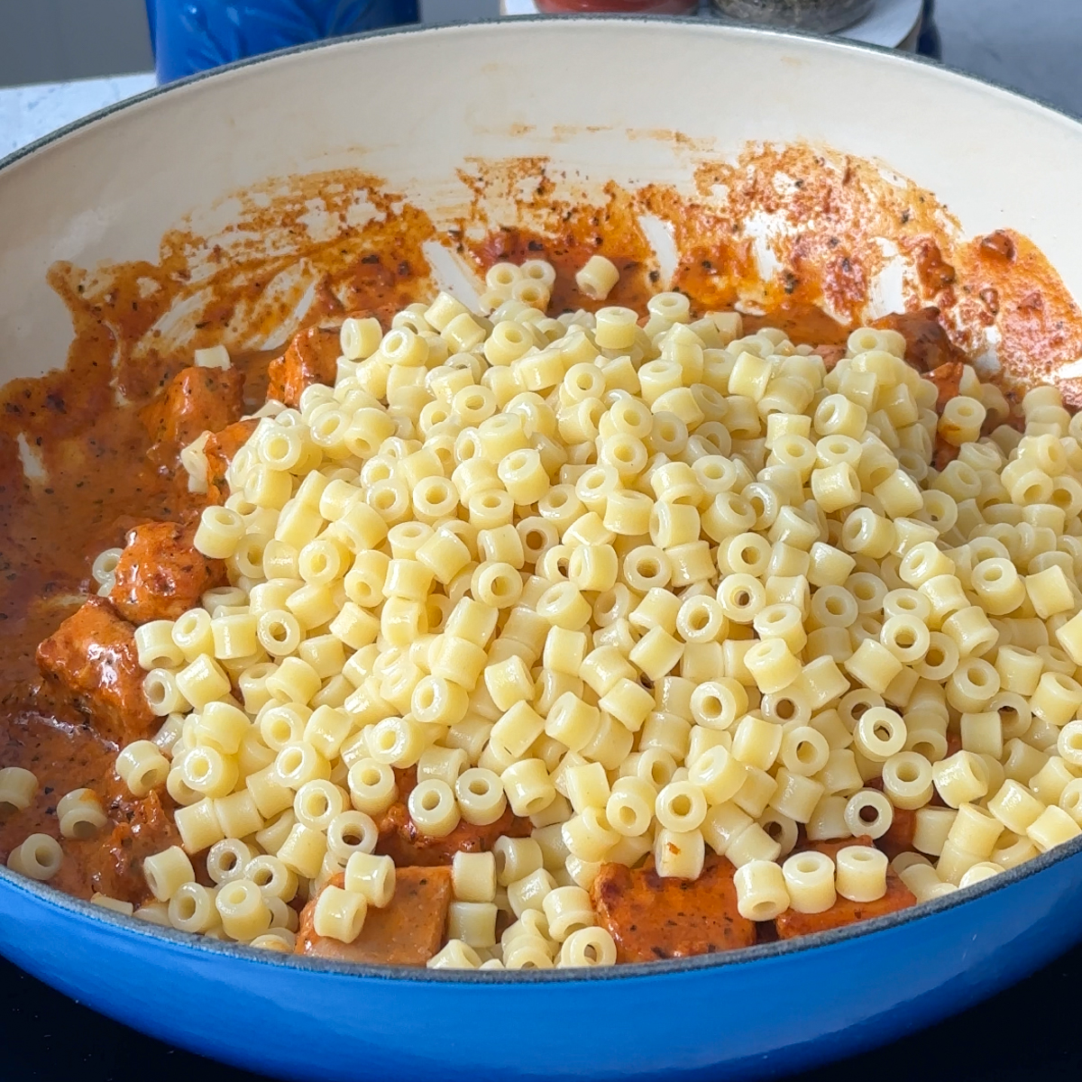 Add in the aldente pasta & mix!