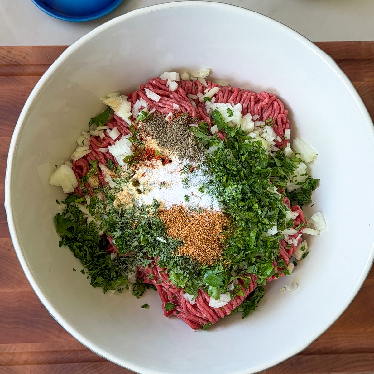 In a big bowl, make the meat mixture!