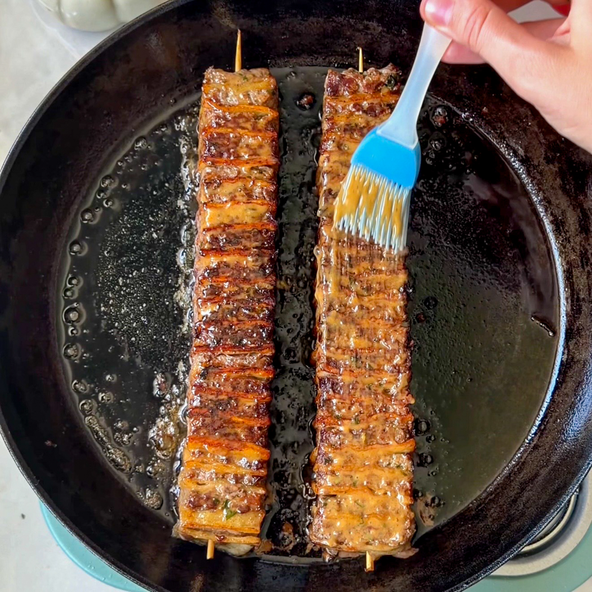 Fry until golden brown & brush with the cajun sauce!