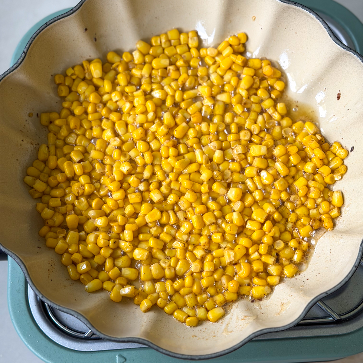 In same pan as the chicken, char the corn!