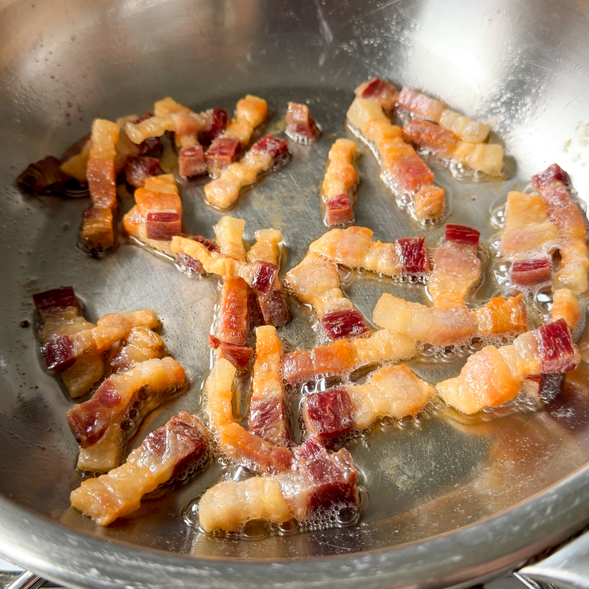 Fry the bacon till golden brown & crispy!
