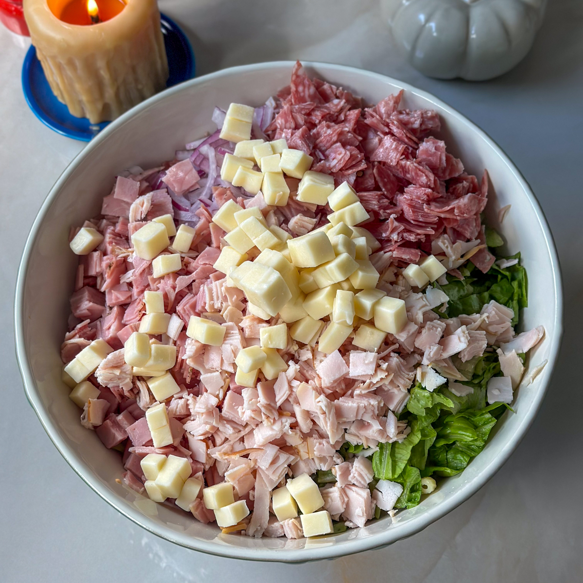 Add all the ingredients to the salad bowl & mix!