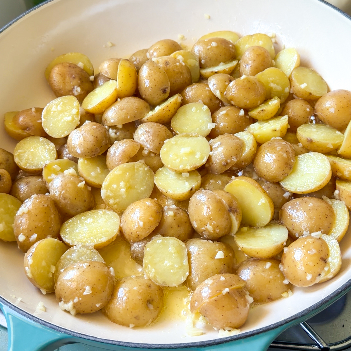 Fry the potatoes in butter with garlic!