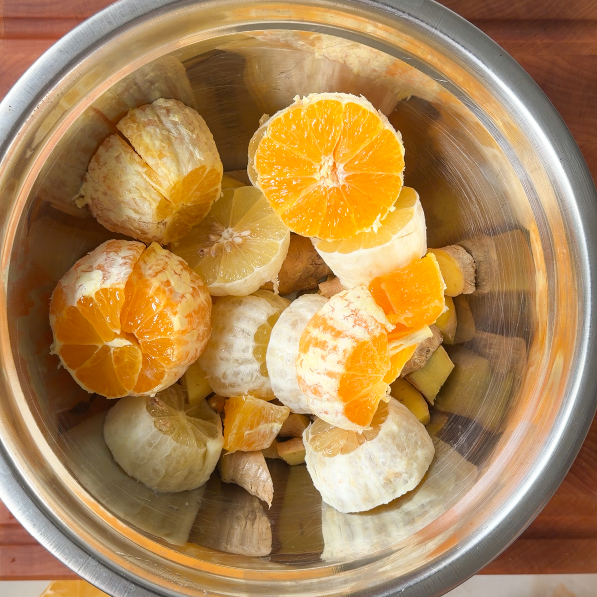 Prep all the fruits! Roughly slice ginger, lemon & oranges!