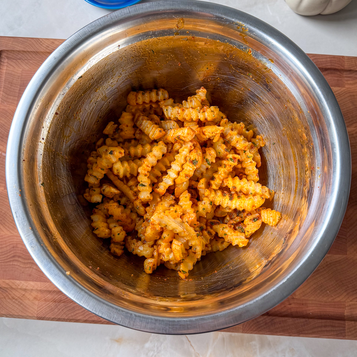 Toss the fries in until fully coated!