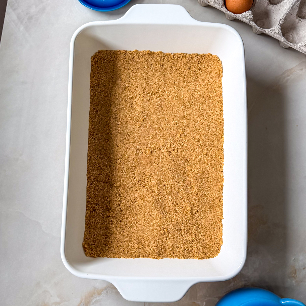 Make the graham cracker crumb base!
