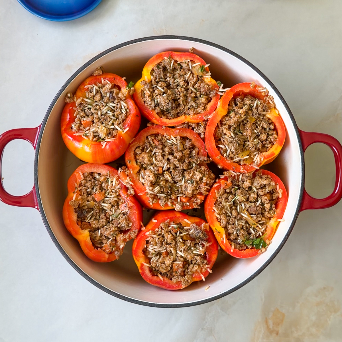 Fill the peppers with the meat mixture!