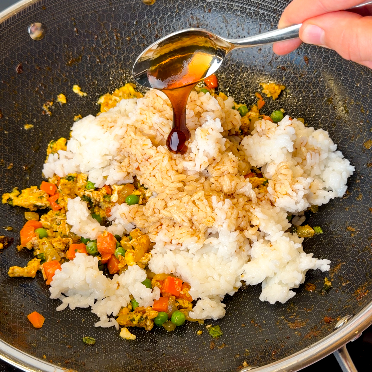 Add in the veggies, eggs, rice, soy sauce & oyster sauce!