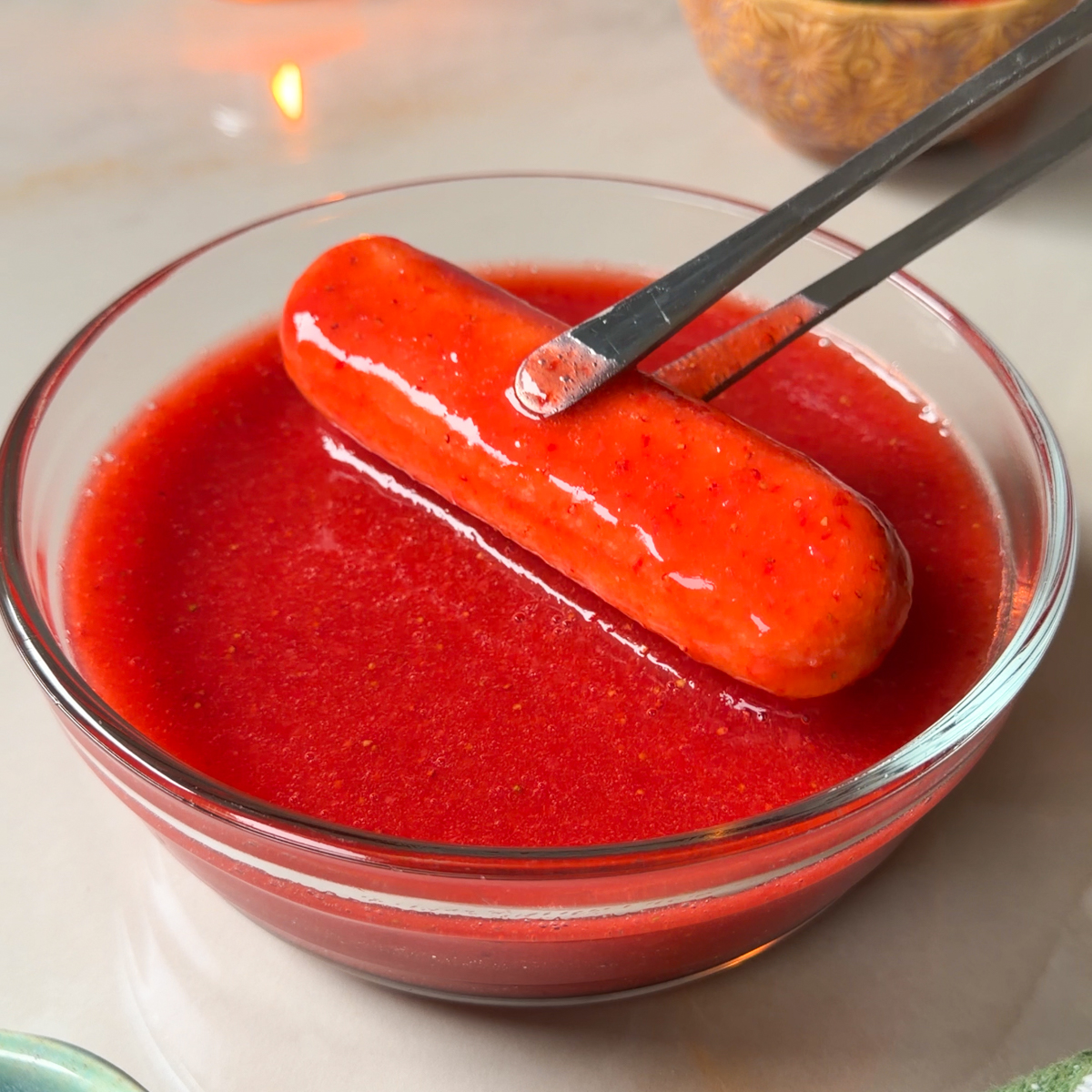 Dip the ladyfingers into that strawberry juice!